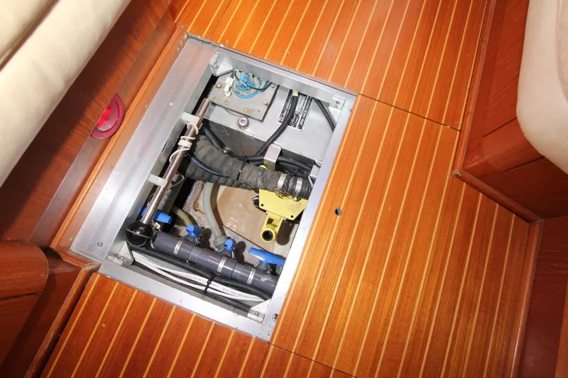 Slide: The Image of Nautor Swan 44MKII 2001 yacht interior showing engine compartment under wooden floor. - 43