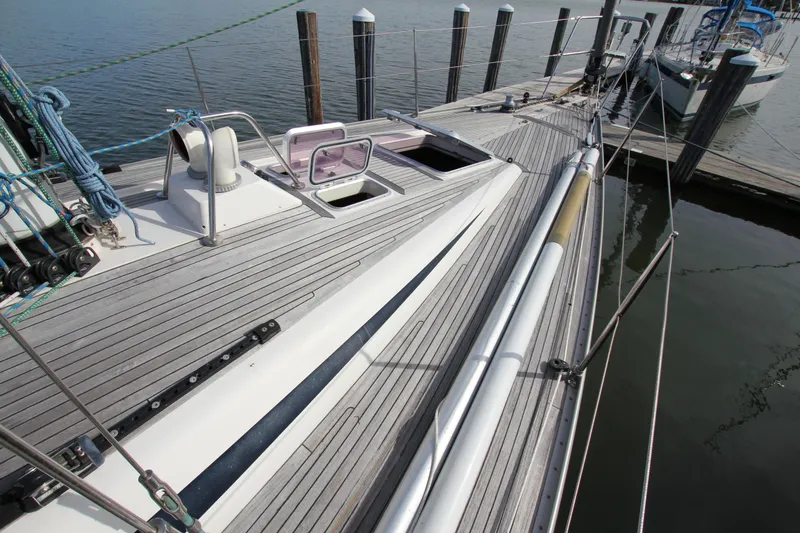 Slide: The Image of Deck view of 2001 Nautor Swan 44MKII yacht docked at marina. - 5