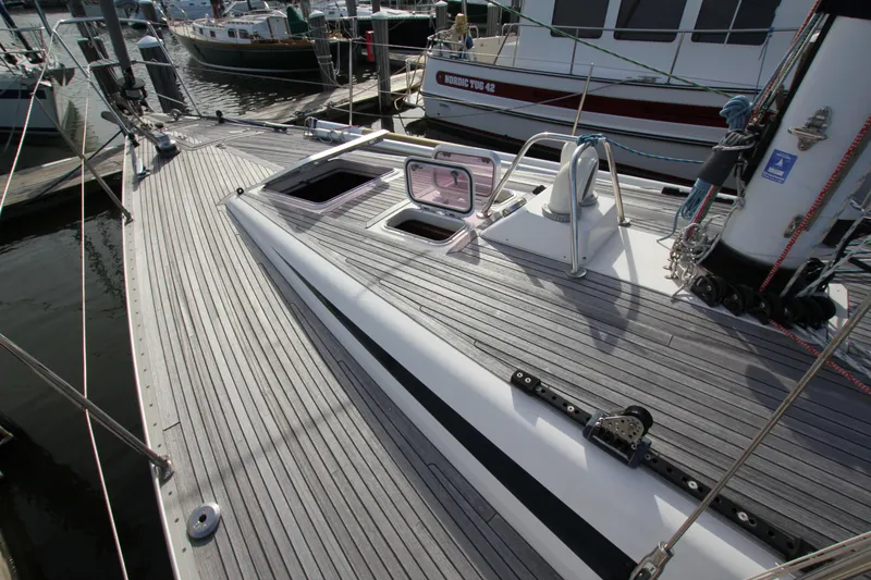 Slide: The Image of Deck of 2001 Nautor Swan 44MKII sailboat, featuring sleek design and modern fittings. - 6