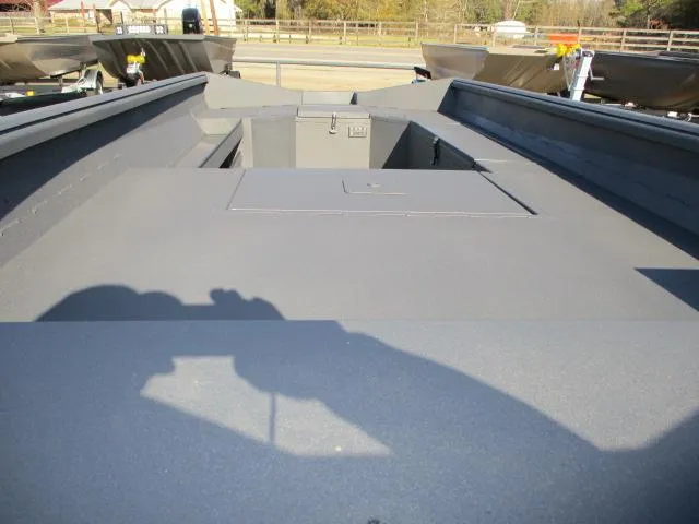 Slide: The Image of 2025 Reaper Boats 756-1231 interior view, showcasing spacious deck and storage area. - 3