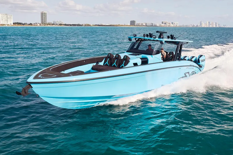 Slide: The Image of 2024 Midnight Express 43' Solstice boat cruising on open water. - 2