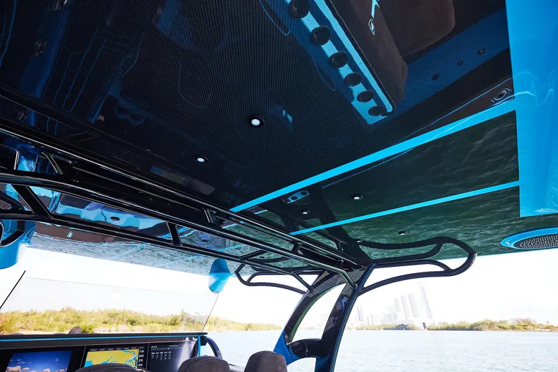 Slide: The Image of 2024 Midnight Express 43' Solstice boat interior with sleek design and advanced technology. - 22