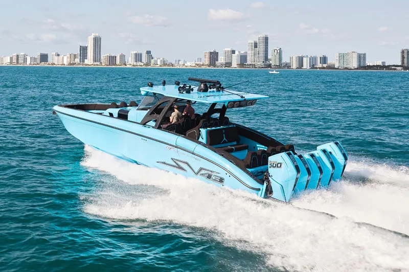 Slide: The Image of 2024 Midnight Express 43' Solstice boat cruising on blue ocean near city skyline. - 3