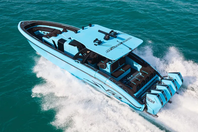 Slide: The Image of 2024 Midnight Express 43' Solstice speedboat cruising on open water. - 4