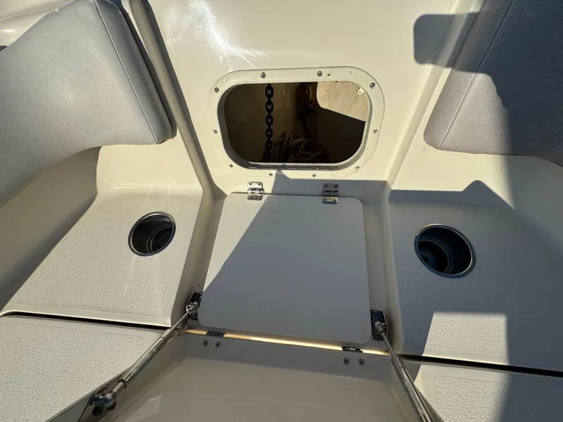 Slide: The Image of 2014 Scout 245 XSF boat interior with anchor storage compartment. - 43