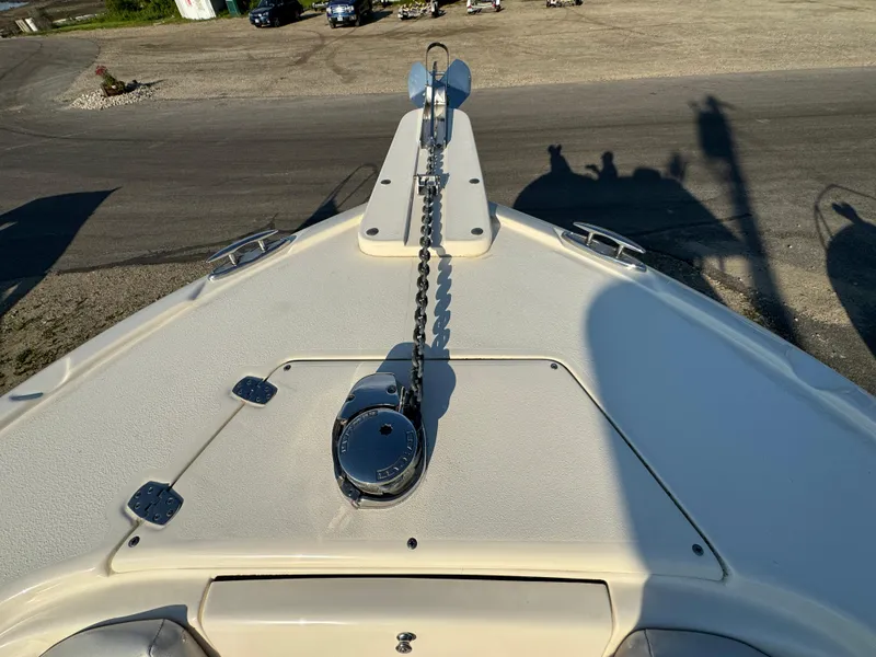 Slide: The Image of Bow of 2014 Scout 245 XSF boat with anchor chain and winch. - 45