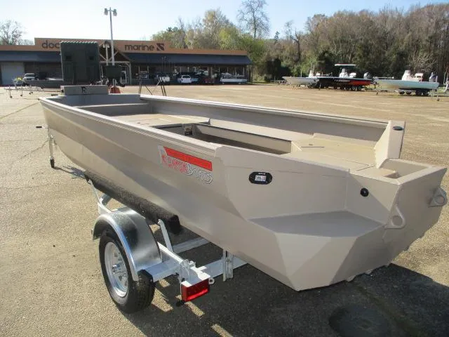 Slide: The Image of 2025 Reaper Boats 653-1236 model on trailer in outdoor setting. - 2