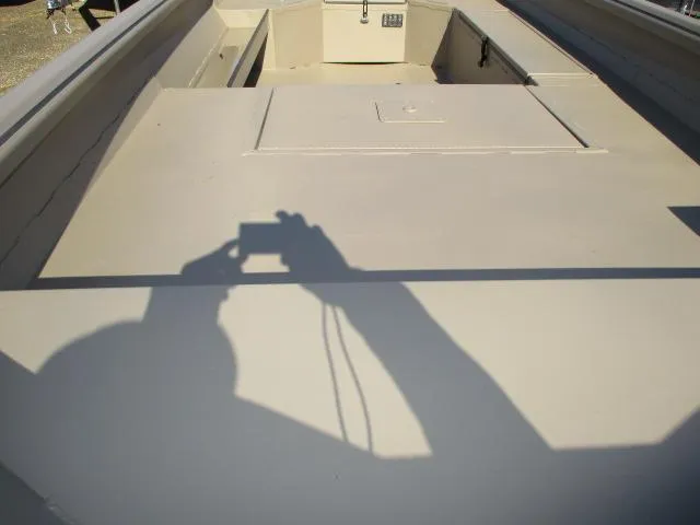 Slide: The Image of 2025 Reaper Boats 653-1236 interior with shadow of person taking a photo. - 4