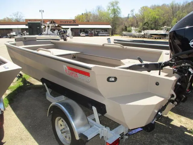 Slide: The Image of 2025 Reaper Boats 653-1236 model on trailer, displayed outdoors at a marine dealership. - 8