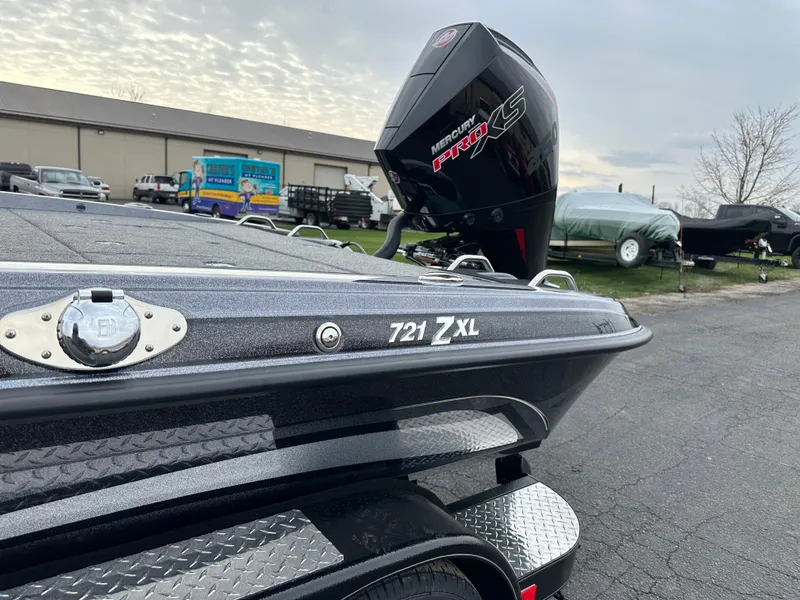 Slide: The Image of 2025 Phoenix 721 ZXL boat with Mercury Pro XS engine in outdoor setting. - 10
