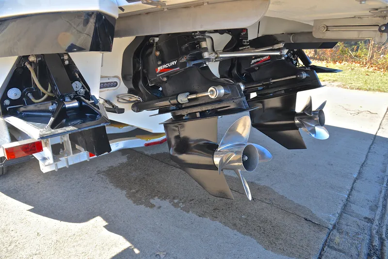 Slide: The Image of 2005 Cobalt 343 boat with dual Mercury outboard motors and stainless steel propellers. - 40