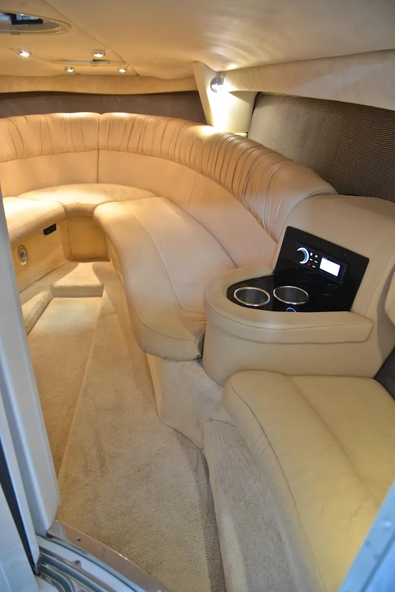 Slide: The Image of Luxurious interior of a 2005 Cobalt 343 boat with plush seating and modern amenities. - 43