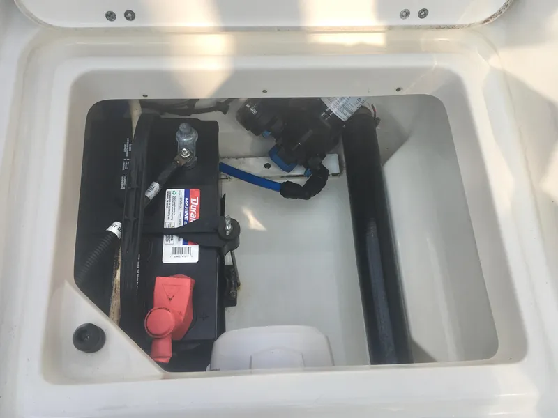 Slide: The Image of Battery compartment of a 2015 Boston Whaler 210 Montauk boat. - 17