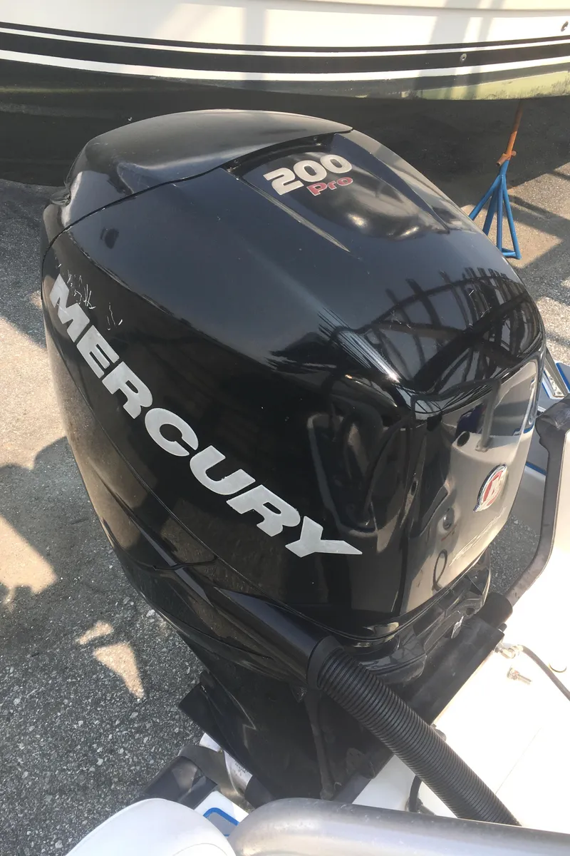 Slide: The Image of Mercury 200 Pro outboard engine on 2015 Boston Whaler 210 Montauk boat. - 21
