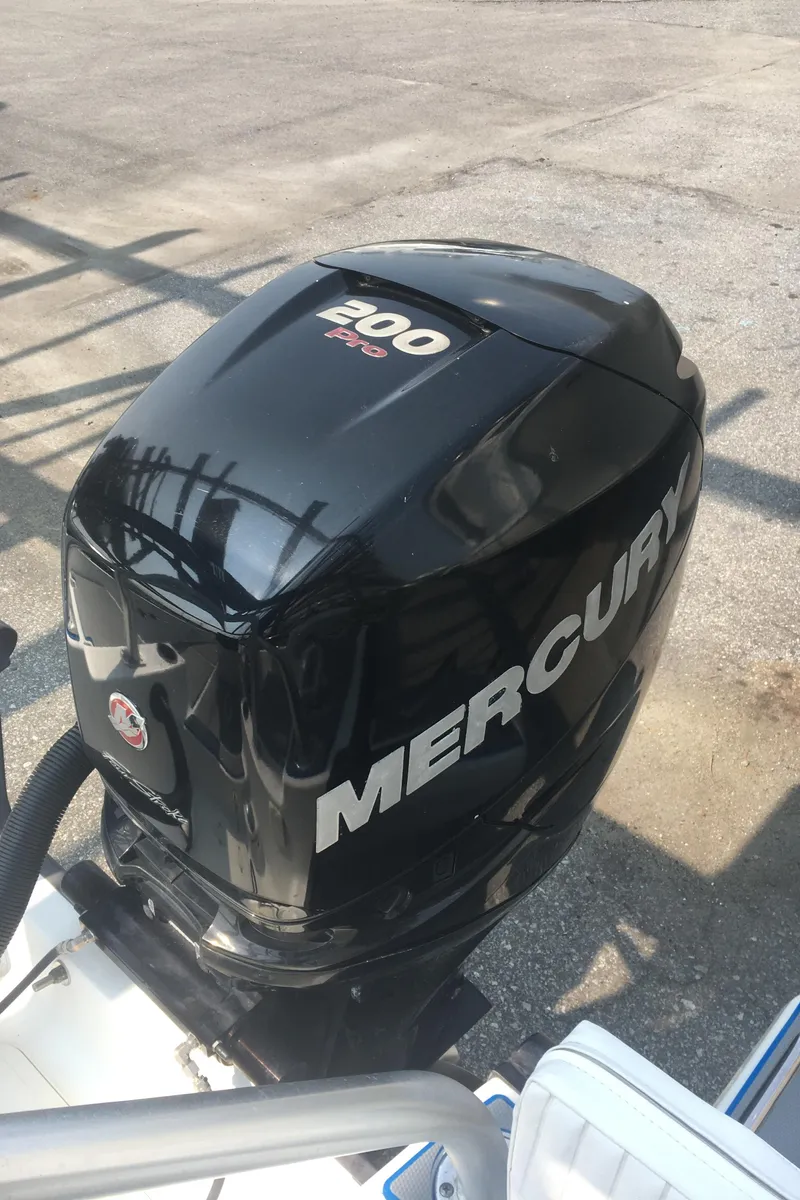 Slide: The Image of Mercury 200 Pro outboard motor on 2015 Boston Whaler 210 Montauk boat. - 22