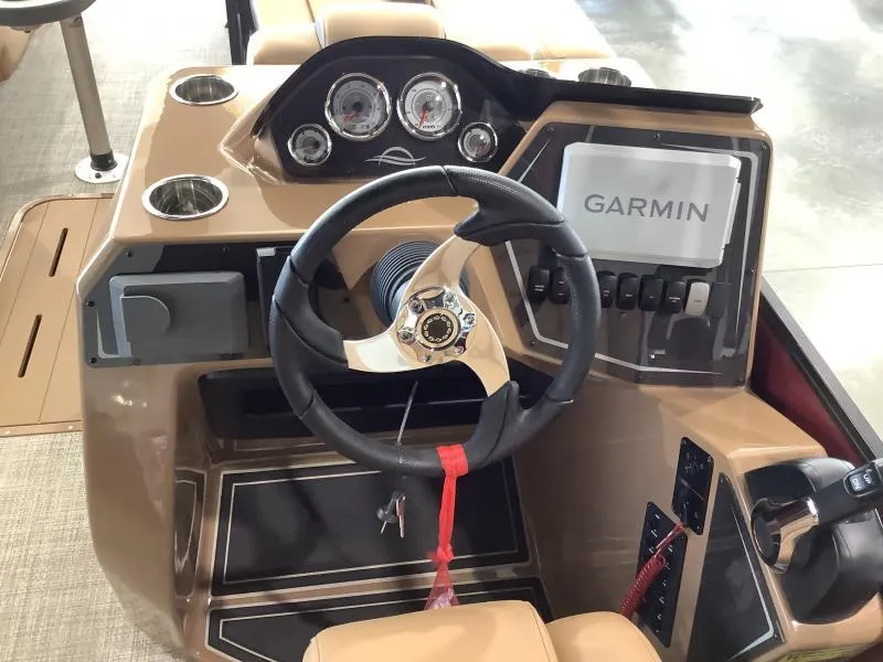 Slide: The Image of 2025 G3 Fusion 322RC boat dashboard with Garmin navigation system. - 10