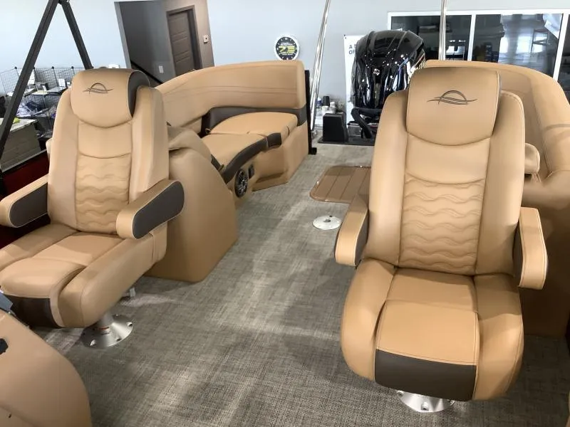 Slide: The Image of 2025 G3 Fusion 322RC boat interior with luxurious tan seating and modern design. - 16