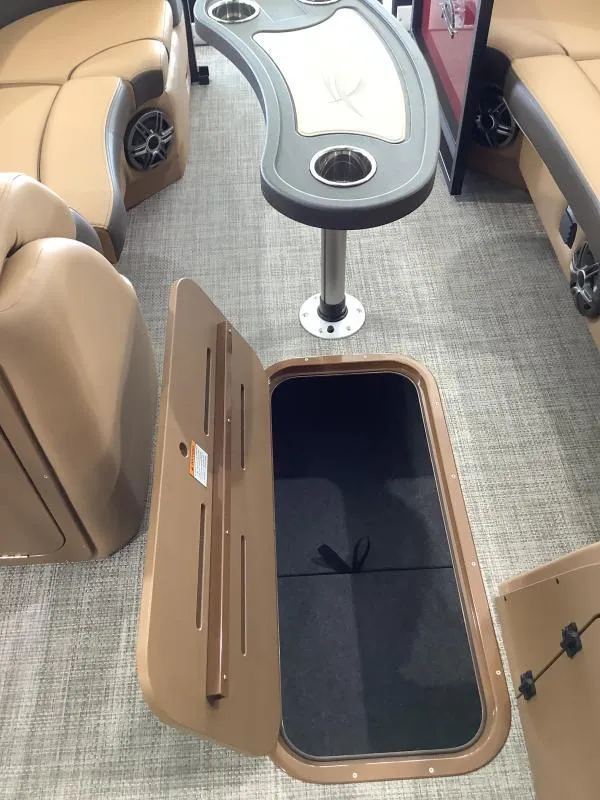 Slide: The Image of 2025 G3 Fusion 322RC boat interior with storage compartment and seating. - 19