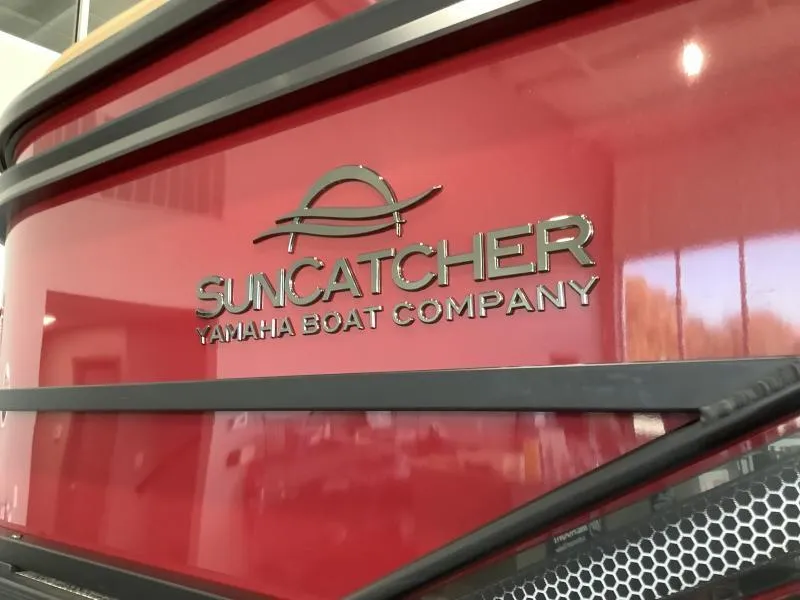 Slide: The Image of 2025 G3 Fusion 322RC Suncatcher boat by Yamaha, red exterior detail. - 4