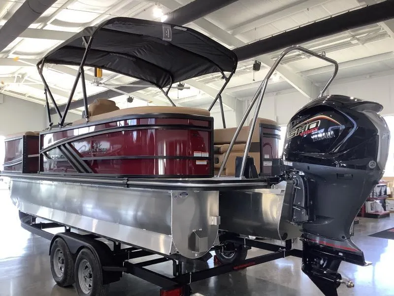 Slide: The Image of 2025 G3 Fusion 322RC pontoon boat with canopy and outboard motor in showroom. - 6