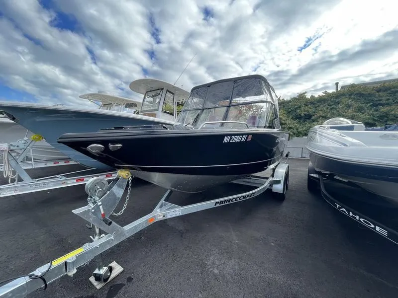 Slide: The Image of 2024 Princecraft AYB5258TS boat on trailer under cloudy sky. - 5