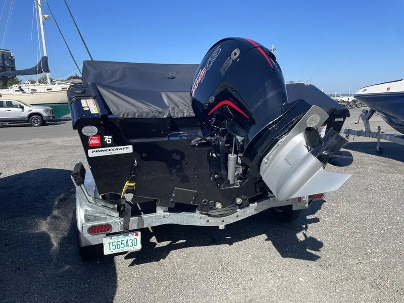 Slide: The Image of 2024 Princecraft AYB5258TS boat with powerful outboard motor on trailer. - 6