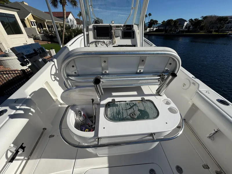 Slide: The Image of 2007 Pro-Line 29 Super Sport boat interior with fishing equipment and console. - 14