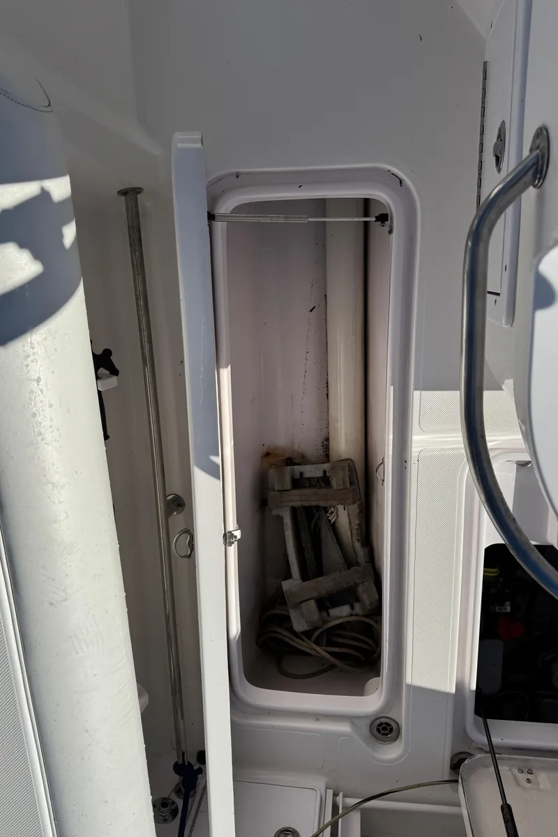 Slide: The Image of Storage compartment on a 2007 Pro-Line 29 Super Sport boat. - 22
