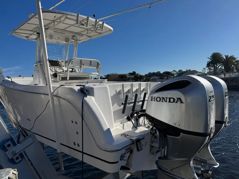 Slide: The Image of 2007 Pro-Line 29 Super Sport boat with dual Honda outboard motors. - 6