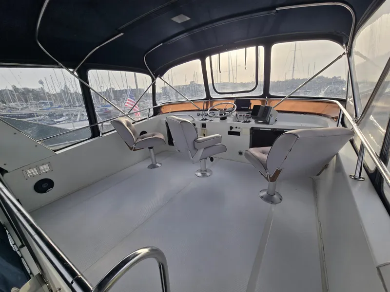 Slide: The Image of Interior of 1991 Cooper Prowler boat with helm and seating area. - 6