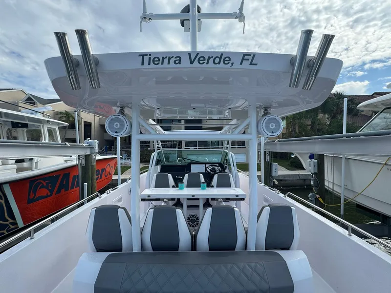 Slide: The Image of 2021 Axopar 37ST boat docked in Tierra Verde, FL, featuring sleek seating and modern design. - 11
