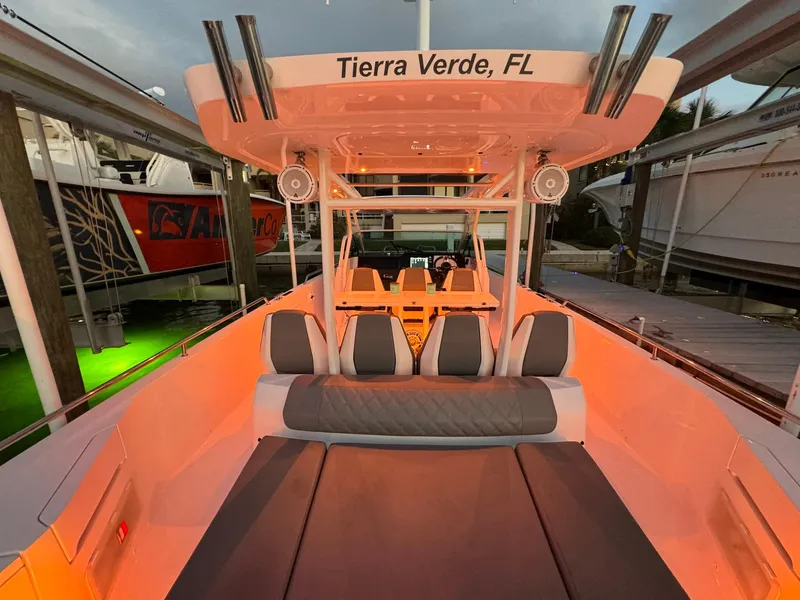 Slide: The Image of 2021 Axopar 37ST boat interior with ambient lighting, docked in Tierra Verde, FL. - 37
