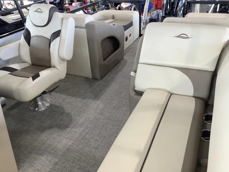 Slide: The Image of 2025 G3 SELECT 324SS boat interior with plush seating and modern design. - 10