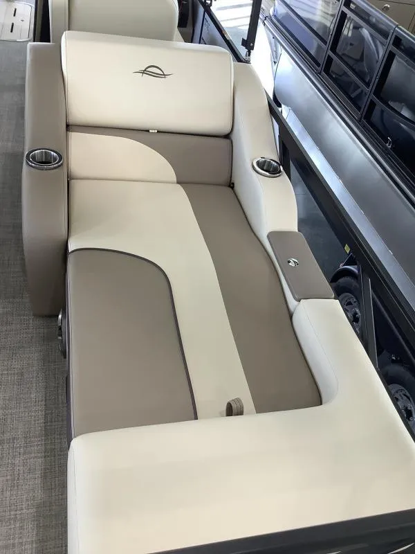 Slide: The Image of 2025 G3 SELECT 324SS boat seating with cup holders, beige and cream upholstery. - 11
