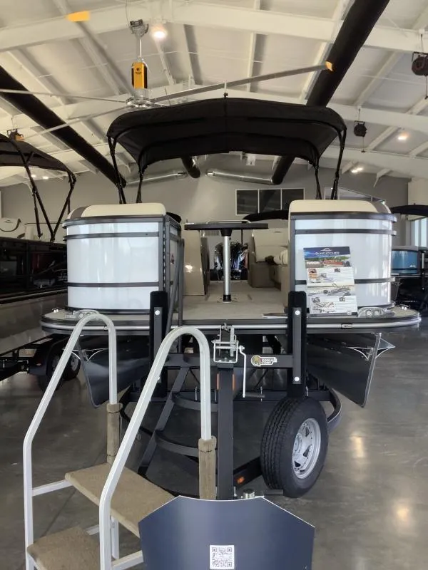 Slide: The Image of 2025 G3 SELECT 324SS pontoon boat displayed in a showroom. - 3