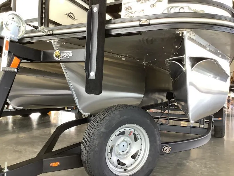 Slide: The Image of 2025 G3 SELECT 324SS pontoon boat on trailer, close-up view. - 5