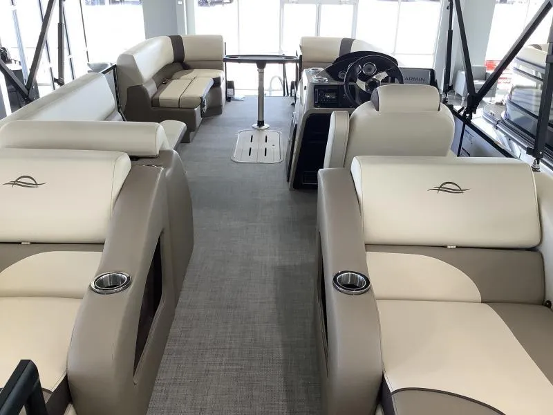 Slide: The Image of Luxurious 2025 G3 SELECT 324SS pontoon boat interior with plush seating and modern design. - 7
