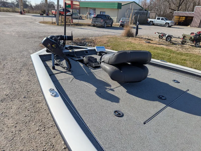 Slide: The Image of 2019 Tracker Pro Team 195 TXW Tournament Edition boat deck with seating and equipment. - 14