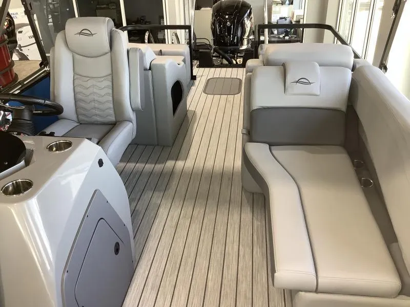 Slide: The Image of 2025 G3 FUSION 324SS boat interior with sleek seating and modern design. - 10