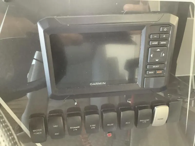 Slide: The Image of Garmin display and control panel on 2025 G3 FUSION 324SS boat. - 18