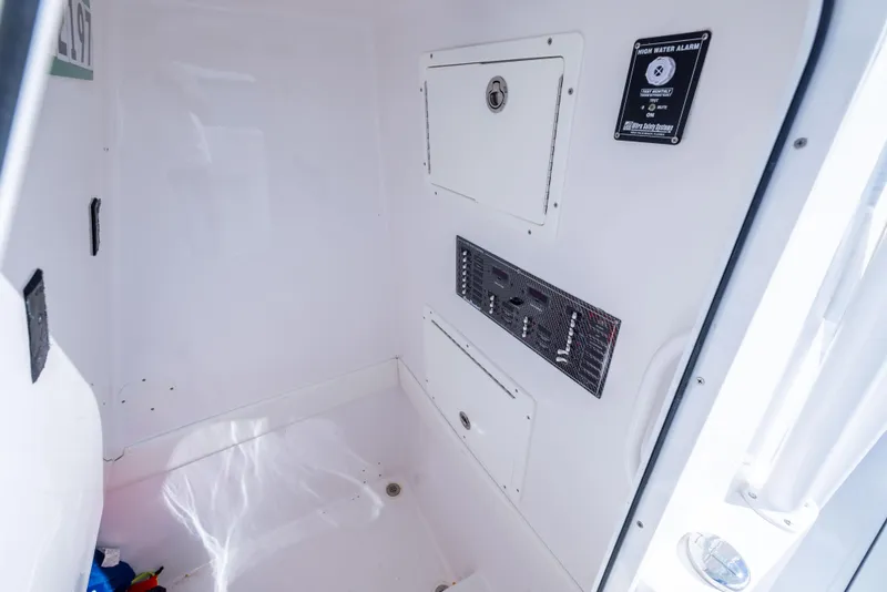 Slide: The Image of Interior of 2018 SeaHunter 33' Center Console boat, featuring storage compartments and sleek design. - 19