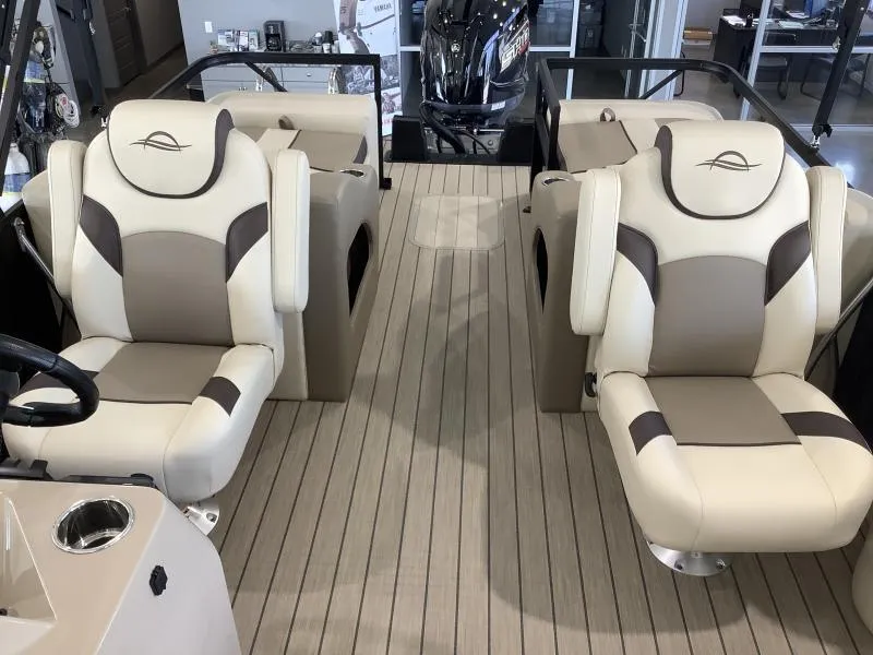 Slide: The Image of 2025 G3 Select 322SS boat interior with beige and brown seating. - 21
