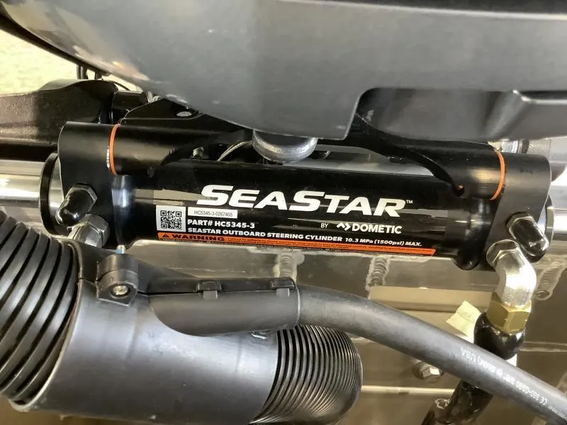 Slide: The Image of SeaStar hydraulic steering cylinder by Dometic on 2025 G3 Select 322SS boat. - 22