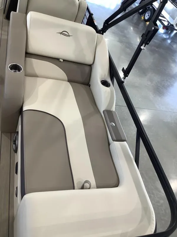 Slide: The Image of 2025 G3 Select 322SS boat seat with beige and white upholstery, cup holders, and sleek design. - 9
