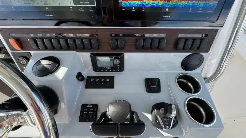 Slide: The Image of Control panel of 2022 Pursuit S 358 Sport boat with advanced navigation systems. - 15