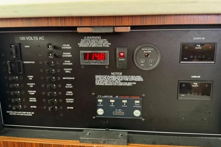 Slide: The Image of Control panel of 2022 Pursuit S 358 Sport boat with various switches and indicators. - 21