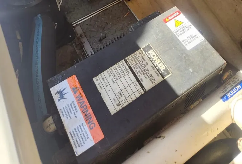 Slide: The Image of Kohler generator in 2008 Formula 330 Sun Sport engine compartment. - 8