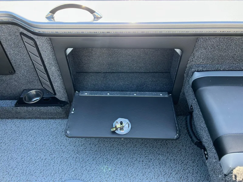 Slide: The Image of 2025 Lund 1875 Pro-V boat interior with storage compartment and seating. - 34