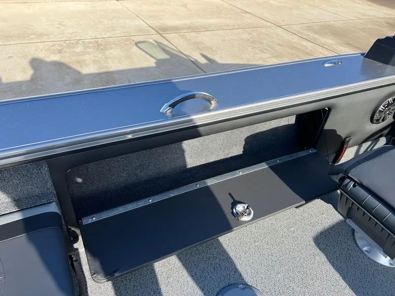 Slide: The Image of 2025 Lund 1875 Pro-V boat storage compartment with sleek design and durable materials. - 35