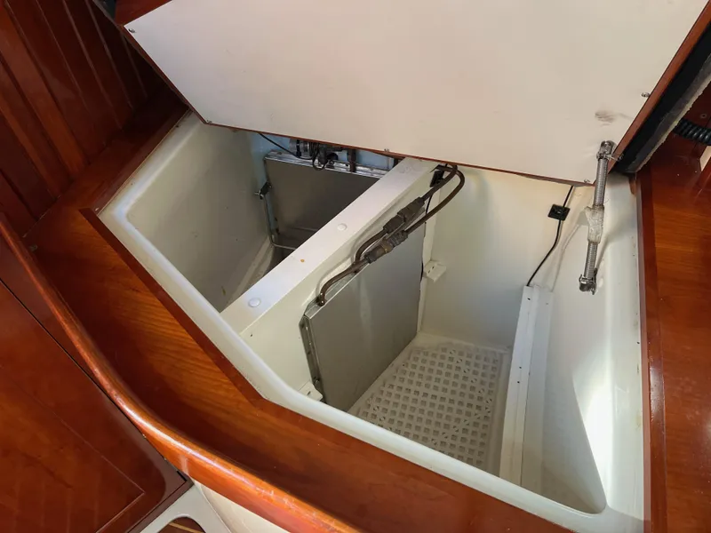 Slide: The Image of Open storage compartment in 2006 Shannon Shoalsailer boat interior. - 10